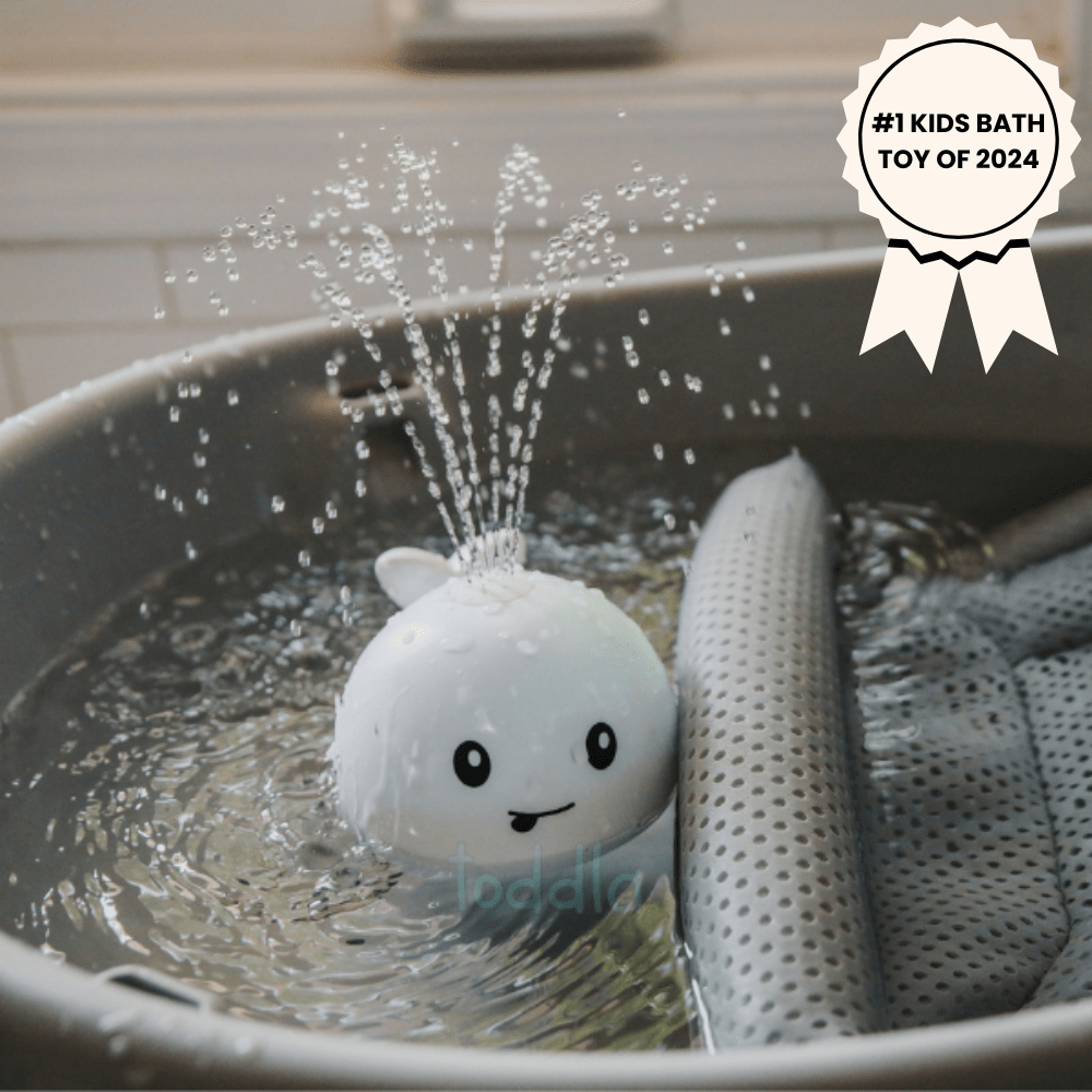 PequeNido™ Juguete de baño con ballena – Diversión salpicante para la hora del baño