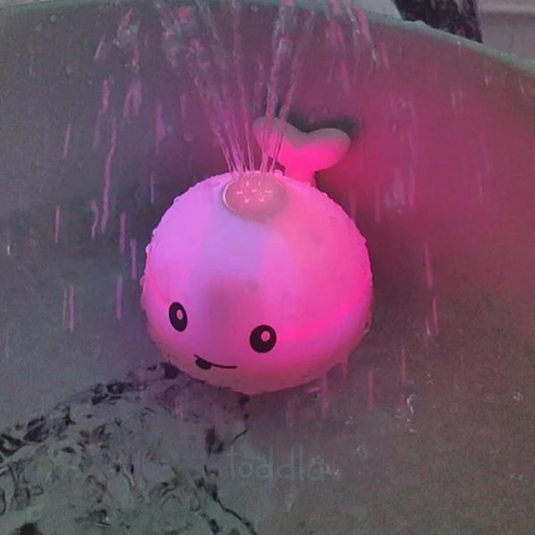 PequeNido™ Juguete de baño con ballena – Diversión salpicante para la hora del baño