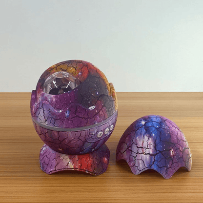 PequeNido™ Proyector de galaxia en forma de huevo de dinosaurio